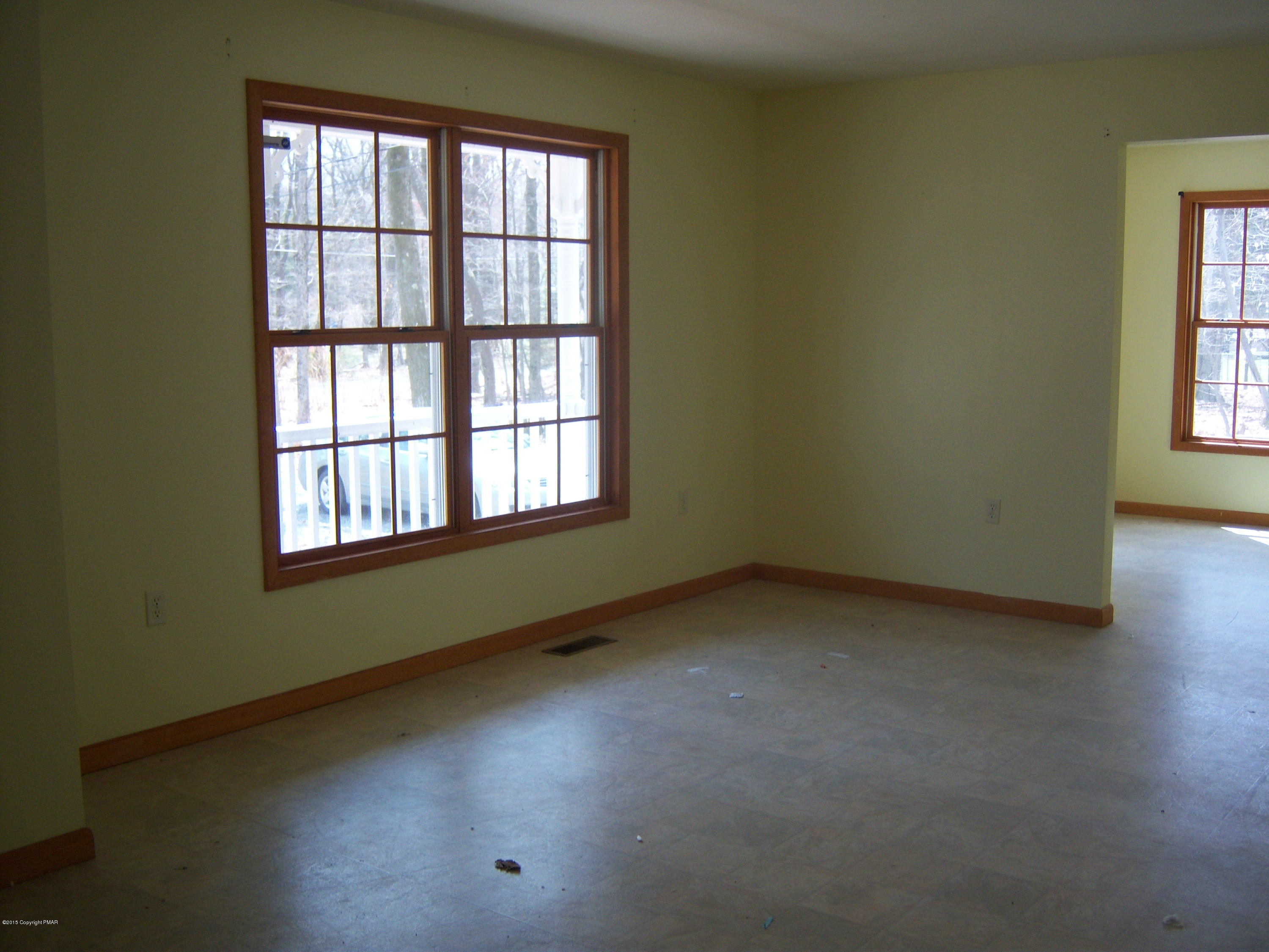 Winchester Road Pocono Summit, PA 18346 - Photo 2 of 7 an empty room with a window