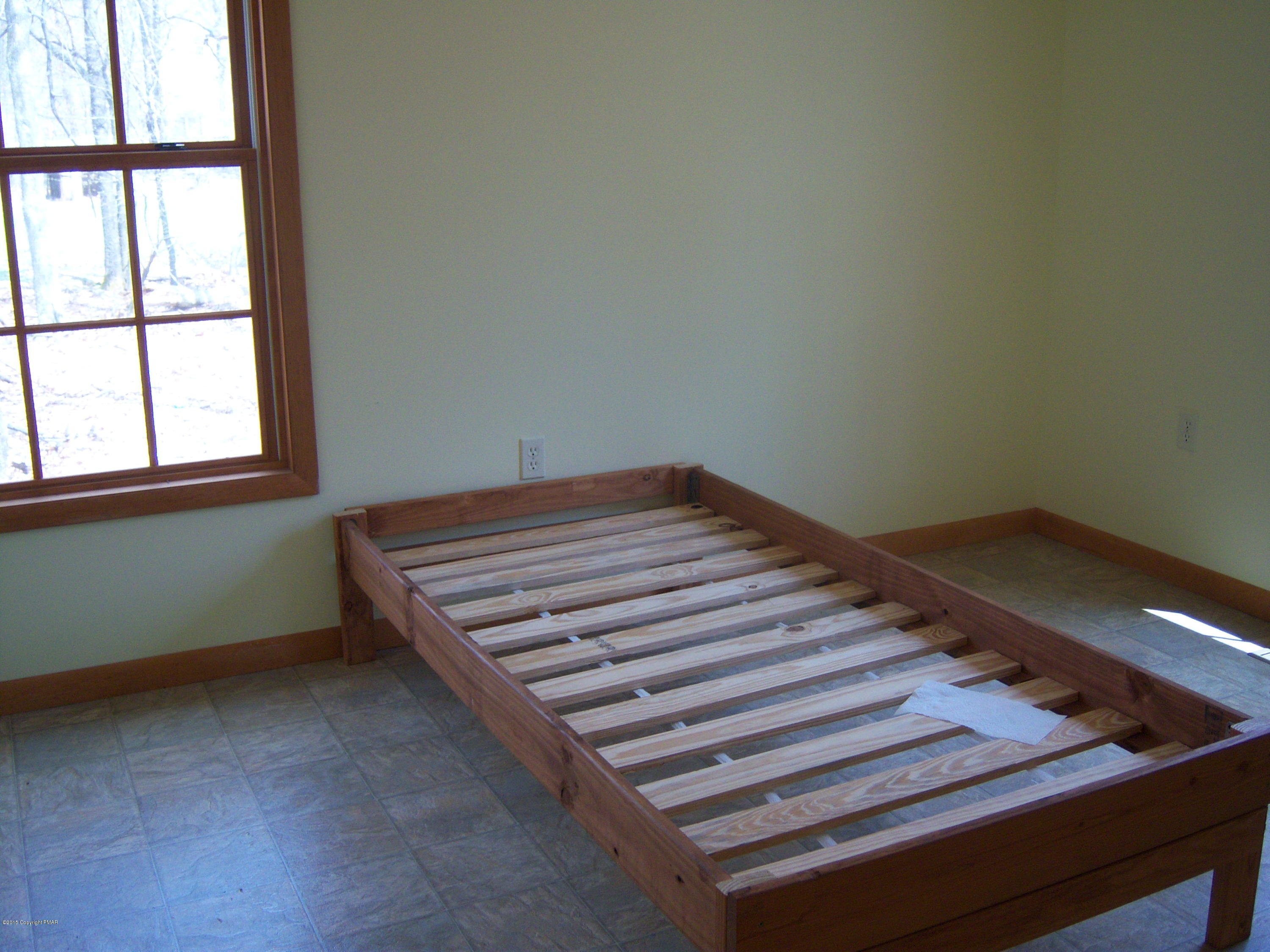 Winchester Road Pocono Summit, PA 18346 - Photo 5 of 7 a view of a room with wooden floor