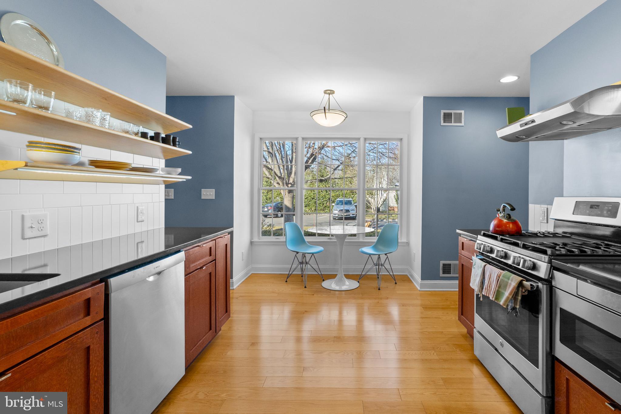47 Hedge Row Road Princeton, NJ 08540 - Photo 7 of 21 a kitchen with stainless steel appliances a stove a sink and a refrigerator