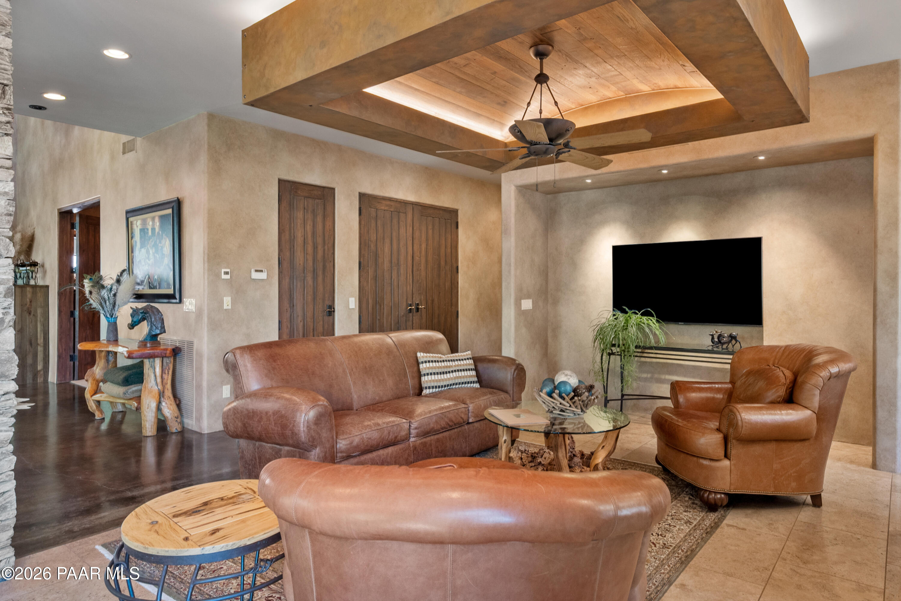 1515 High Valley Ranch Road Prescott, AZ 86303 - Photo 30 of 76 a living room with furniture and a flat screen tv
