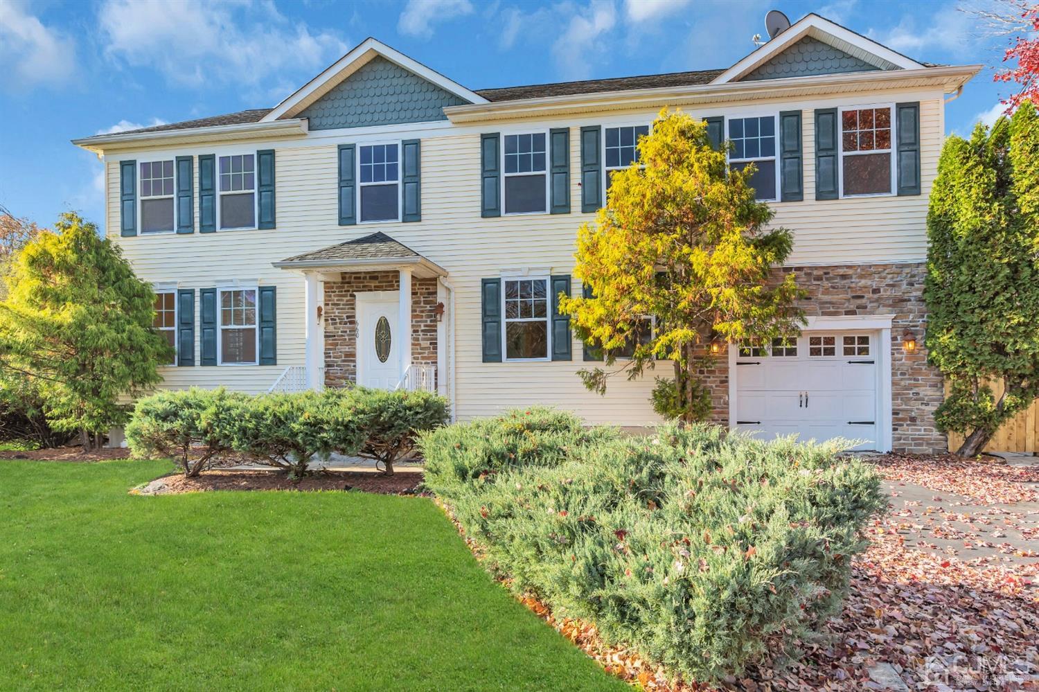 660 Ridge Road Monmouth Junction, NJ 08852 - Photo 3 of 52 front view of a house with a yard