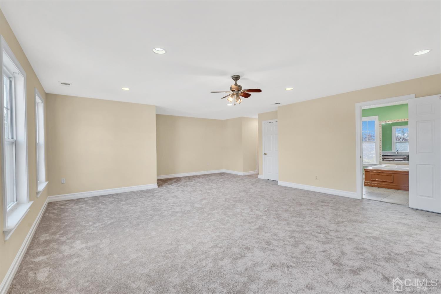 660 Ridge Road Monmouth Junction, NJ 08852 - Photo 26 of 52 wooden floor in an empty room with a window