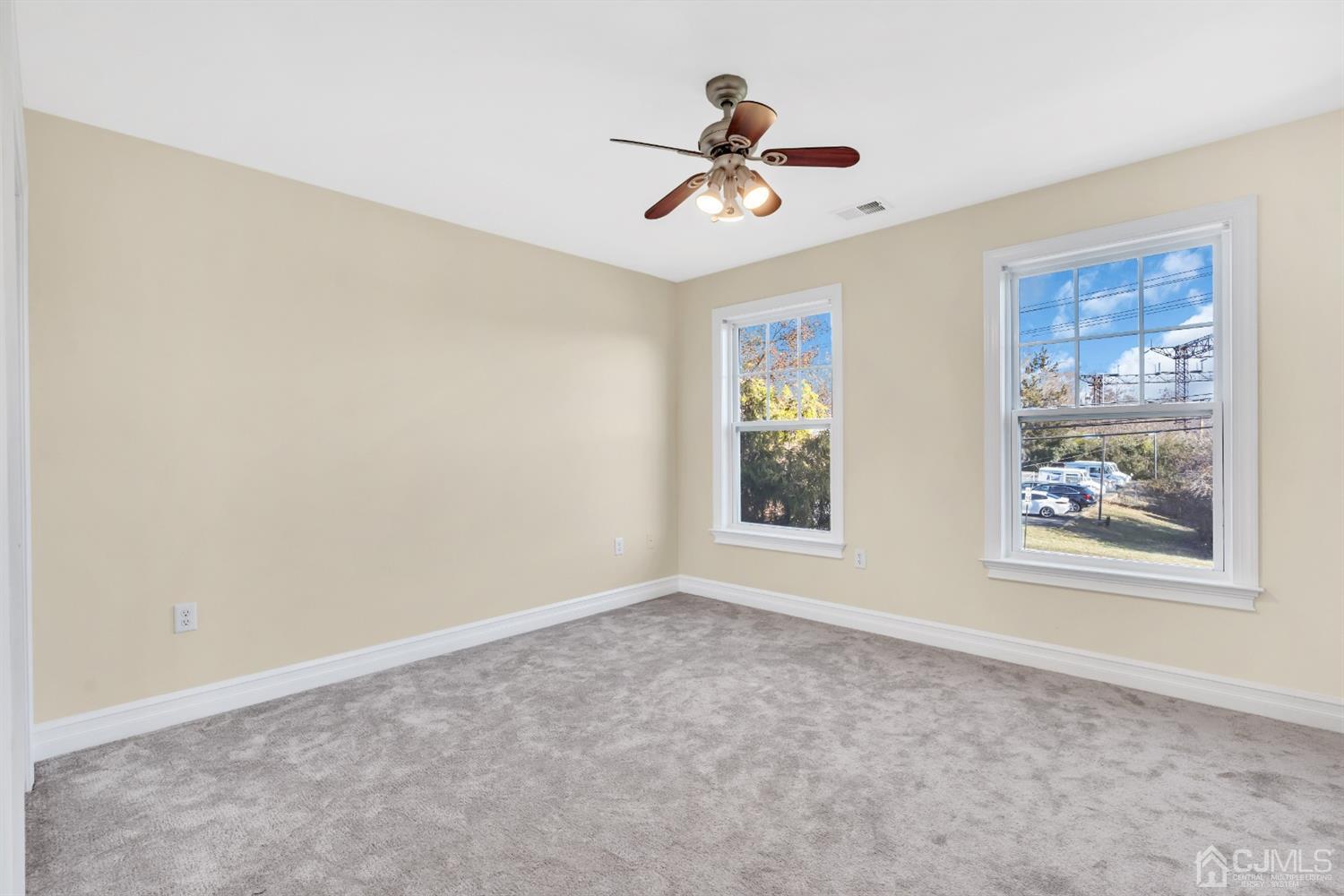 660 Ridge Road Monmouth Junction, NJ 08852 - Photo 35 of 52 a view of room with window and ceiling fan