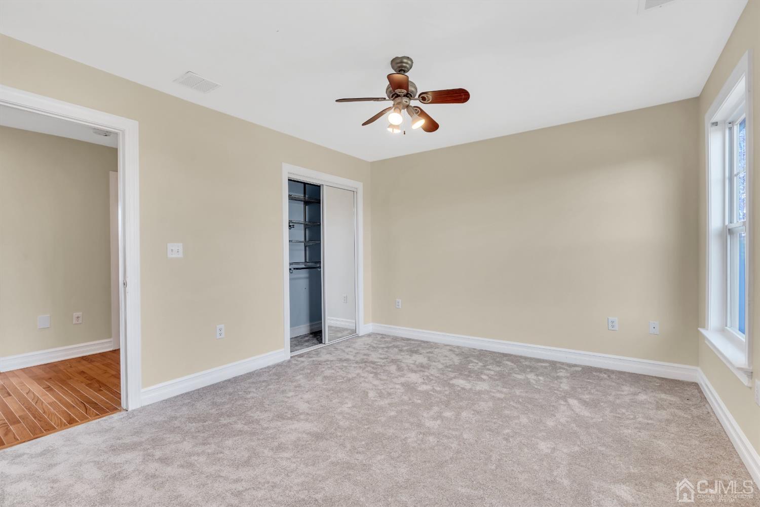 660 Ridge Road Monmouth Junction, NJ 08852 - Photo 37 of 52 a view of an empty room with a window