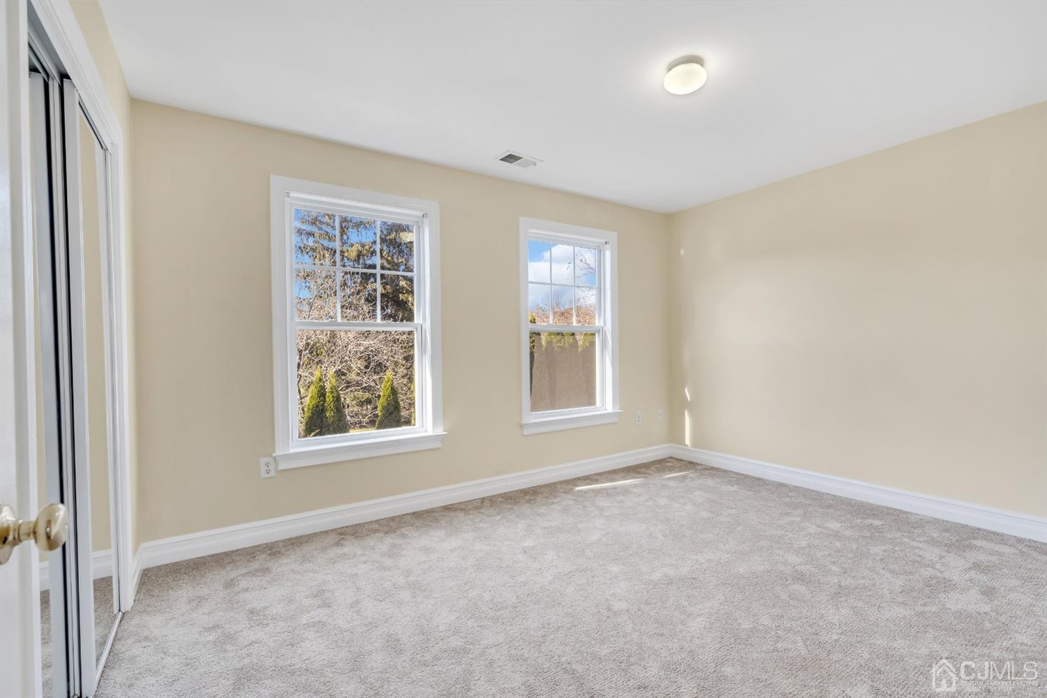 660 Ridge Road Monmouth Junction, NJ 08852 - Photo 40 of 52 an empty room with windows