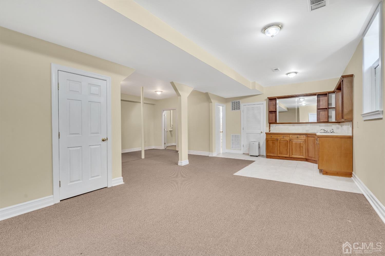660 Ridge Road Monmouth Junction, NJ 08852 - Photo 49 of 52 a view of a big room with closet and windows