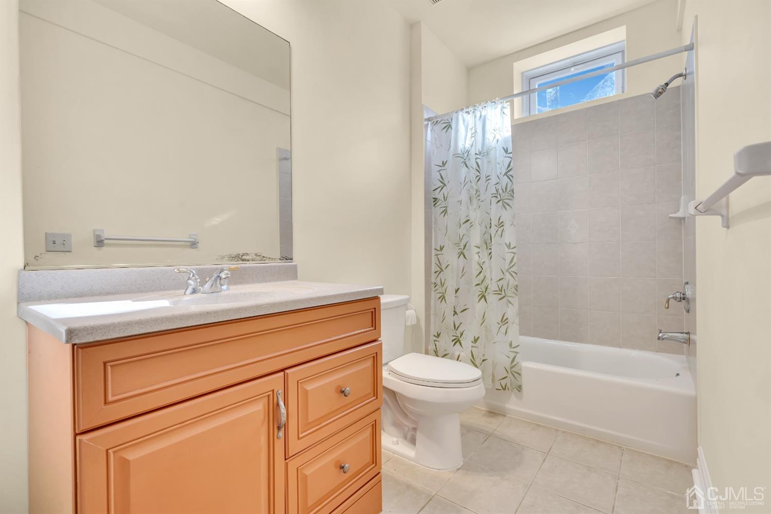 660 Ridge Road Monmouth Junction, NJ 08852 - Photo 51 of 52 a bathroom with a sink a toilet and shower