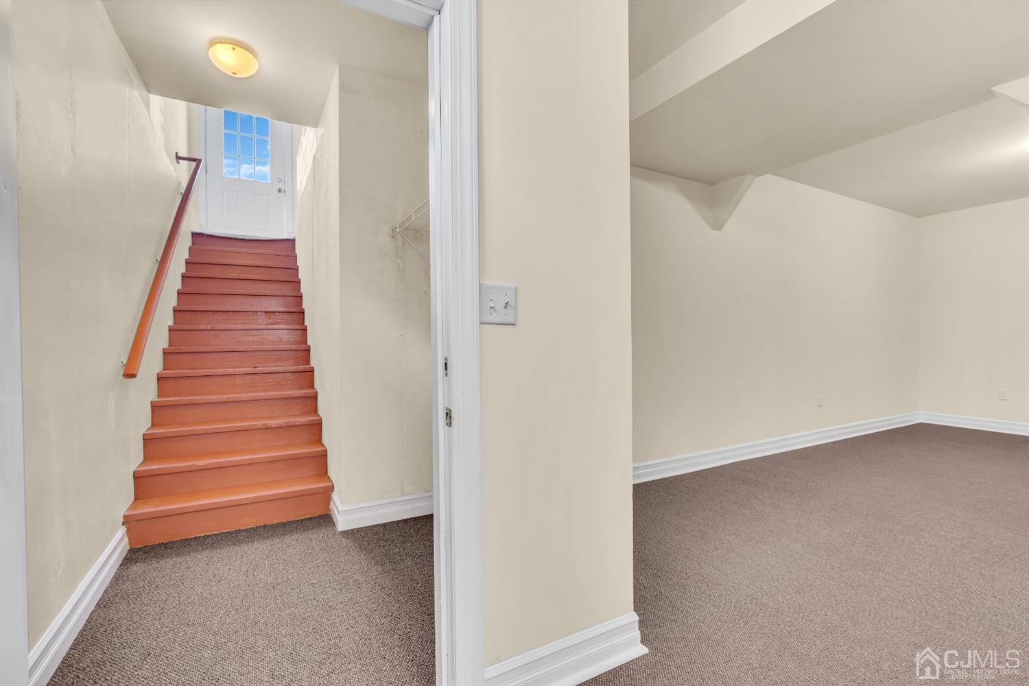 660 Ridge Road Monmouth Junction, NJ 08852 - Photo 52 of 52 a view of a hallway with stairs