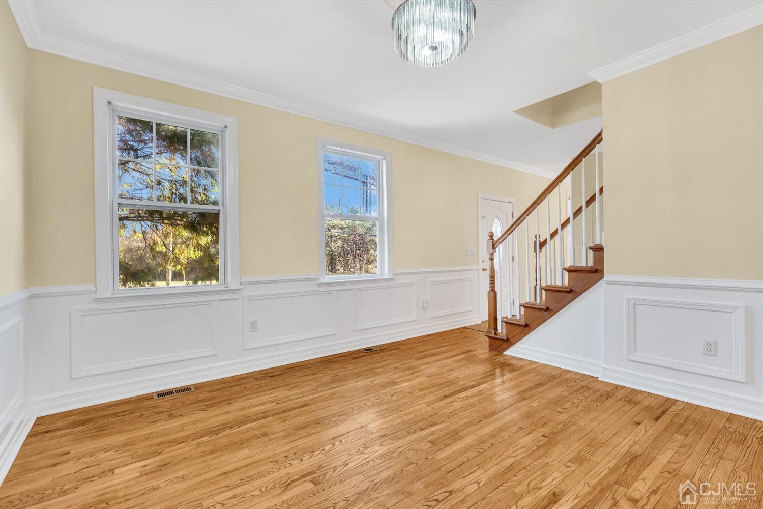 660 Ridge Road Monmouth Junction, NJ 08852 - Photo 7 of 52 a view of an entryway with wooden floor