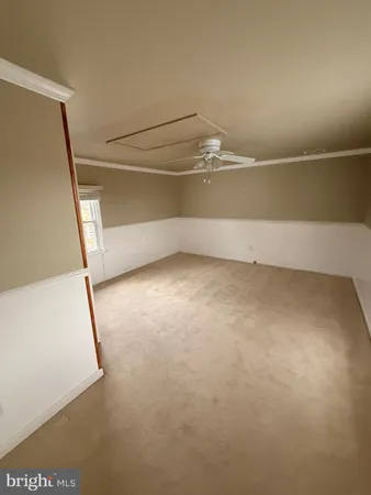 a view of a room with an empty space