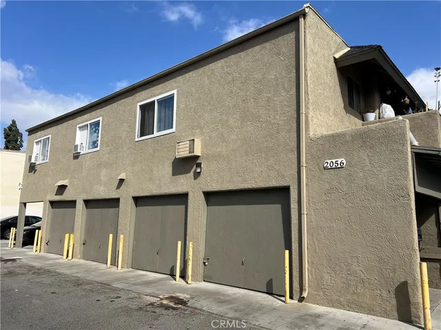 a view of a house with a street