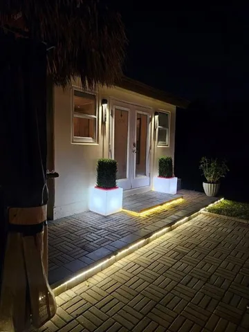 a bathroom with a sink a mirror and a shower