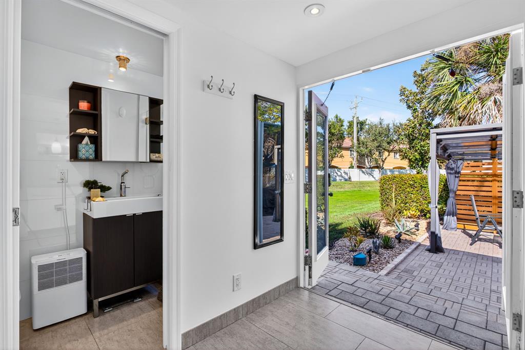 6 South Cortez Drive, Unit 6 Margate, FL 33068 - Photo 19 of 34 a view of living room with furniture and garden view