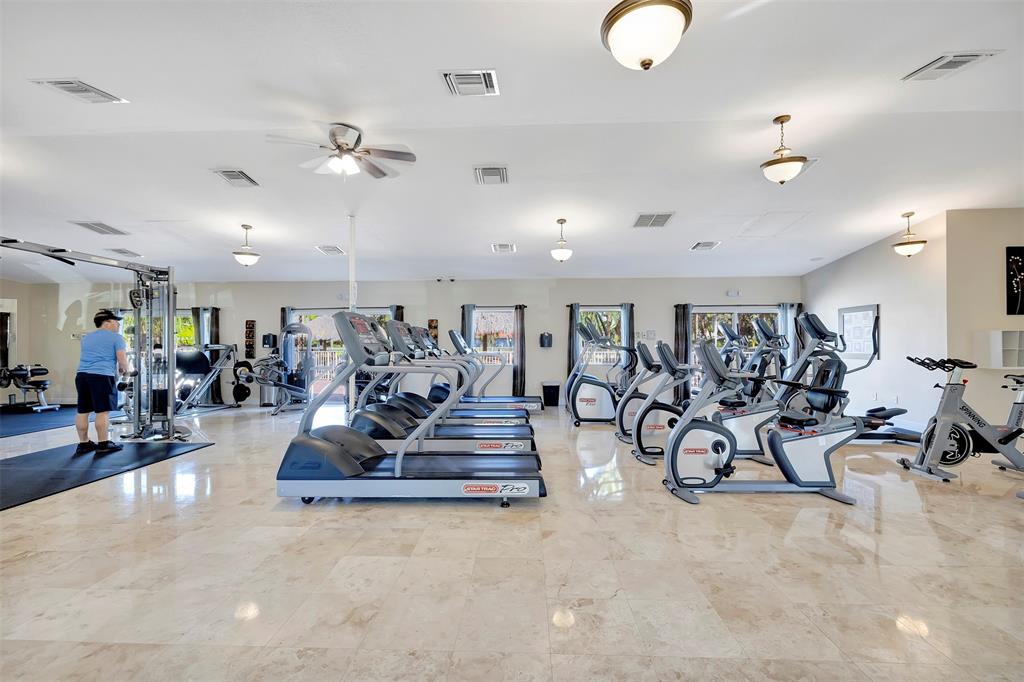 6 South Cortez Drive, Unit 6 Margate, FL 33068 - Photo 30 of 34 a view of a room with gym equipment