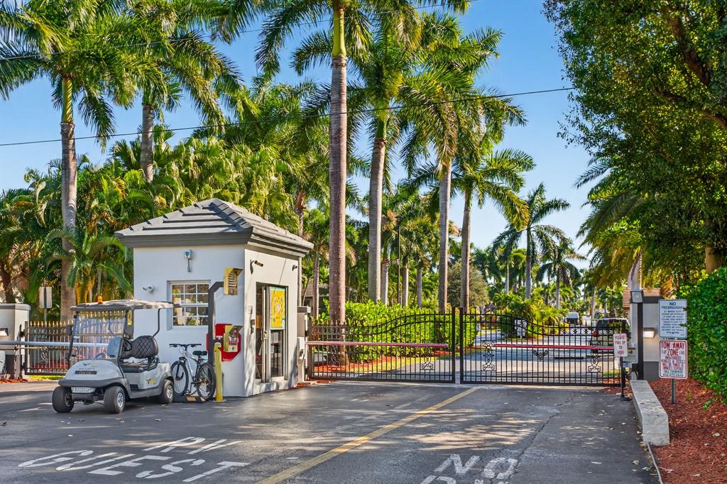 6 South Cortez Drive, Unit 6 Margate, FL 33068 - Photo 33 of 34 a view of a street with a cars parked in front of it
