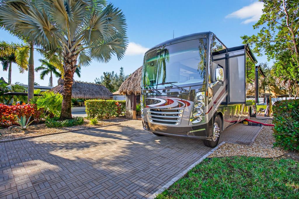 6 South Cortez Drive, Unit 6 Margate, FL 33068 - Photo 34 of 34 a view of a house with backyard and sitting area