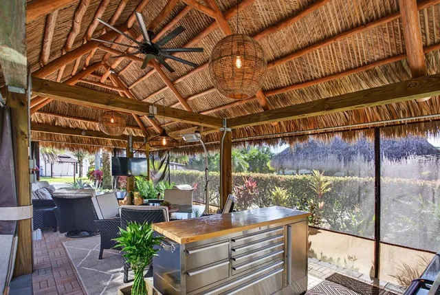 a view of a chairs and table in a patio