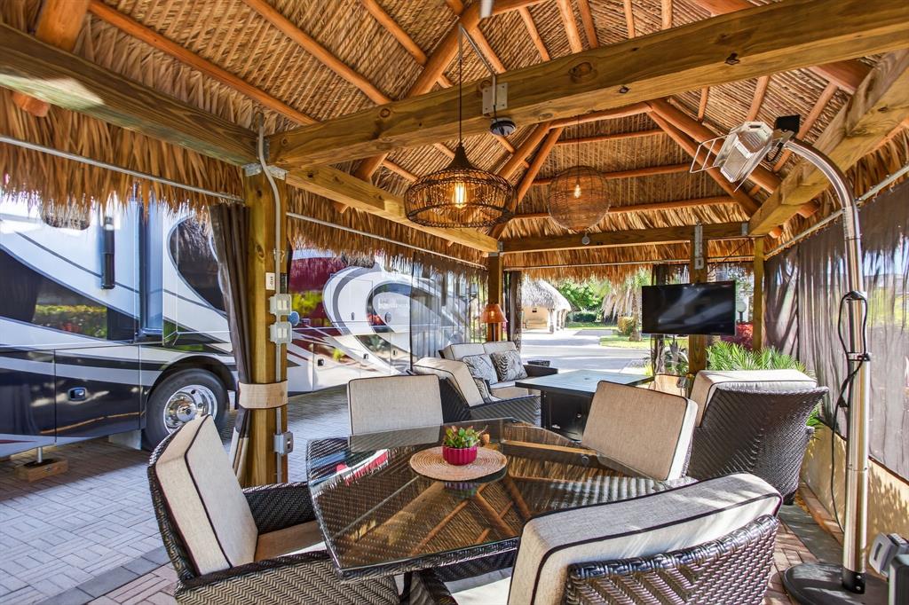 6 South Cortez Drive, Unit 6 Margate, FL 33068 - Photo 7 of 34 a outdoor space with patio furniture and wooden floor