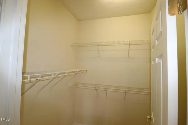 a view of a room with racks on the wall