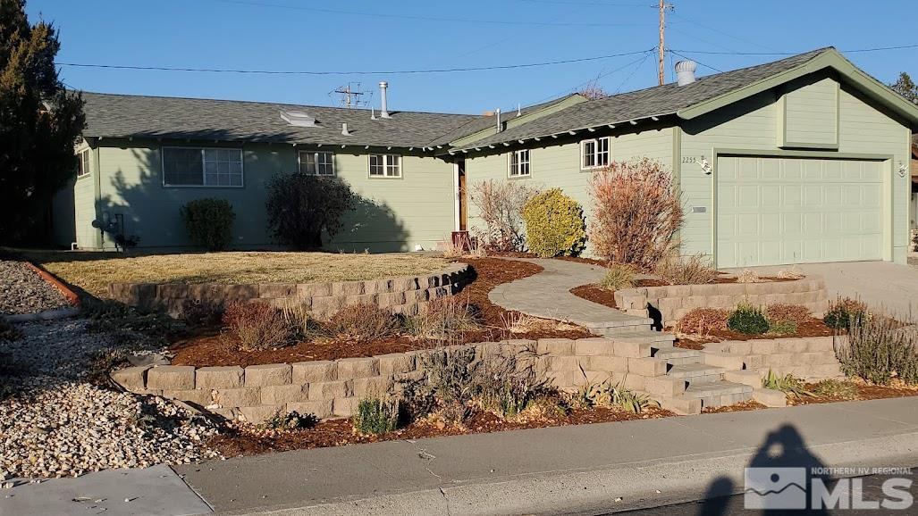 2255 Ward Place Reno, NV 89503 - Photo 1 of 13 a view of a back yard of the house