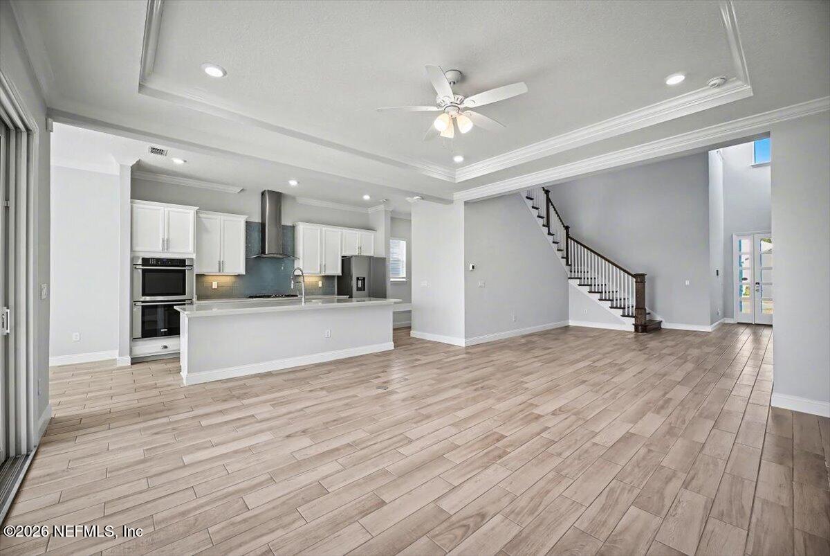 282 Caribbean Place St. Johns, FL 32259 - Photo 12 of 56 a view of kitchen with wooden floor and electronic appliances