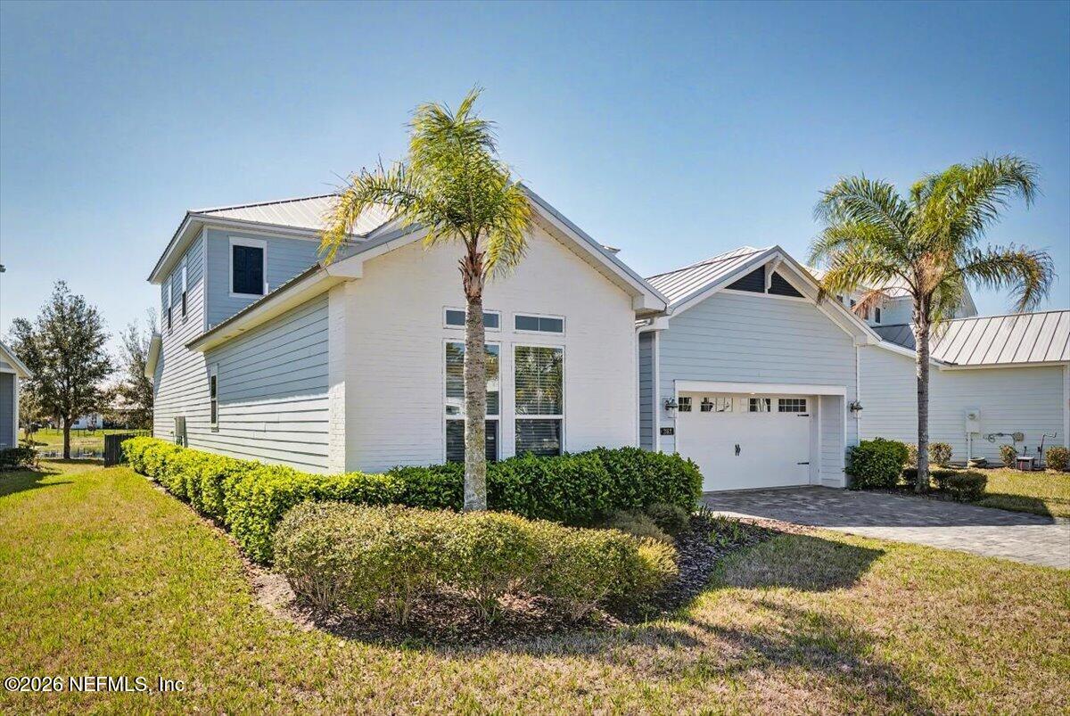 282 Caribbean Place St. Johns, FL 32259 - Photo 3 of 56 a front view of a house with a yard