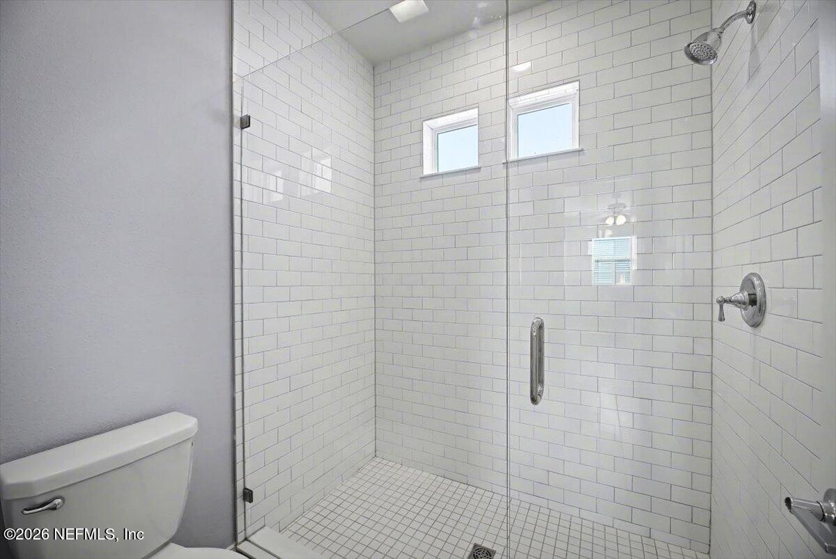282 Caribbean Place St. Johns, FL 32259 - Photo 39 of 56 a bathroom with a toilet and shower
