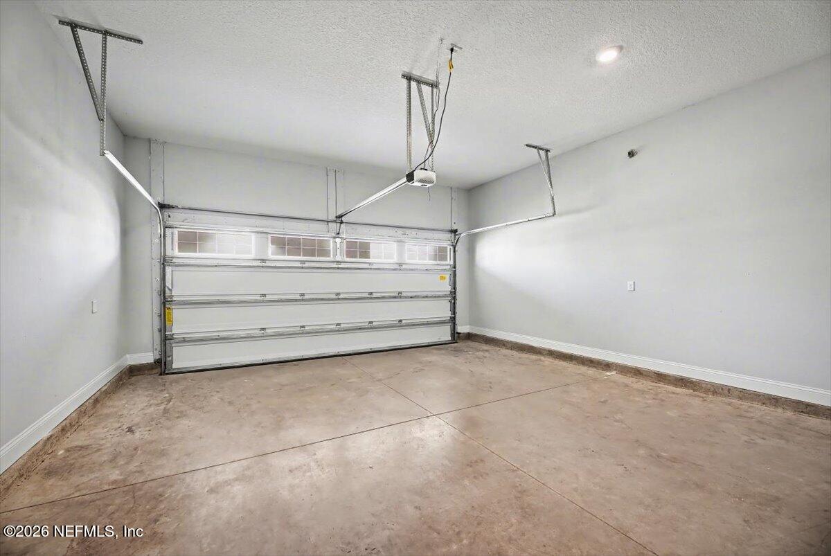 282 Caribbean Place St. Johns, FL 32259 - Photo 45 of 56 a view of a room with racks on the wall