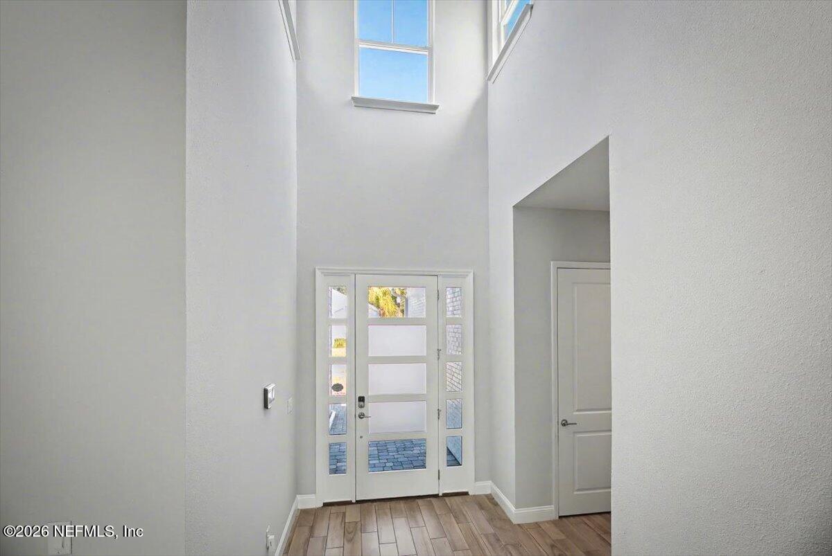 282 Caribbean Place St. Johns, FL 32259 - Photo 5 of 56 a view of room with wooden floor