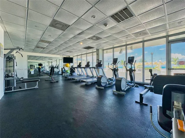 a room with furniture and screen