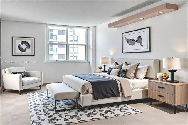 a bedroom with a bed and a couch