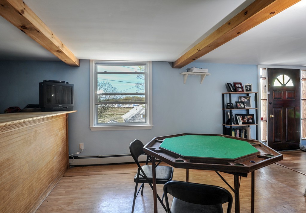 32 Colonial Road Weymouth, MA 02191 - Photo 5 of 19 a view of a dining room with furniture and a window