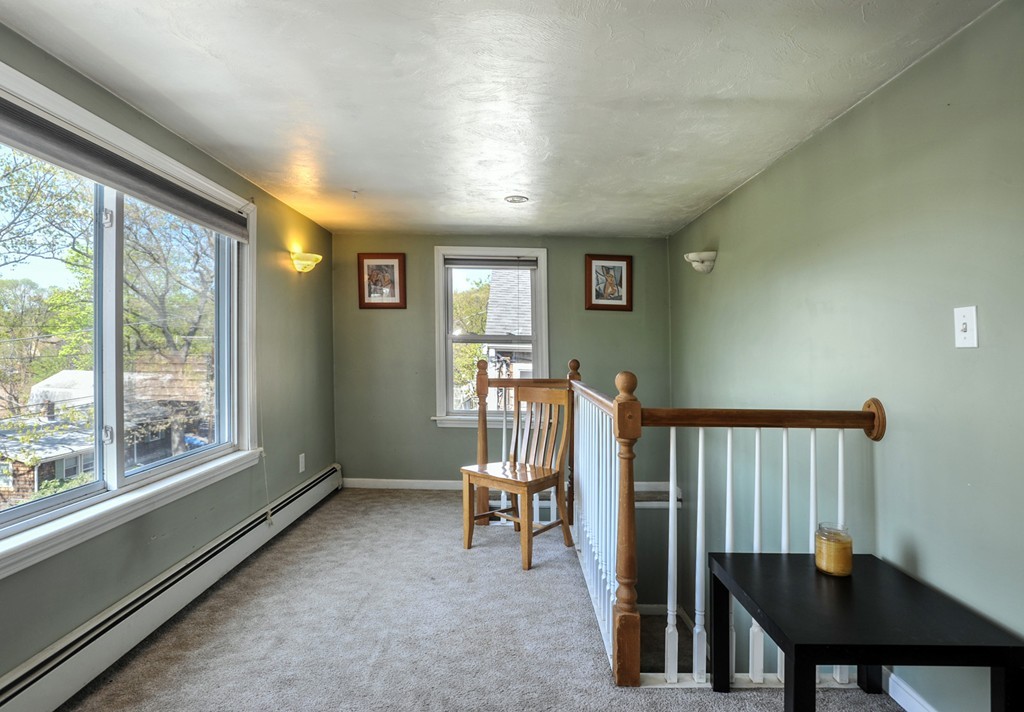 32 Colonial Road Weymouth, MA 02191 - Photo 8 of 19 a view of livingroom with furniture and windows