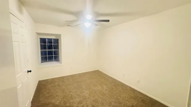 a bathroom with a double vanity sink and mirror