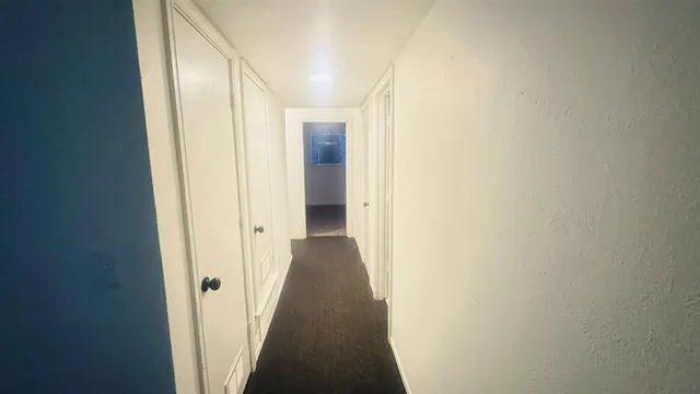 a bathroom with a double vanity sink and mirror