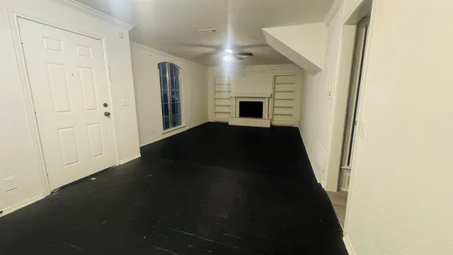 a kitchen that has a sink and a stove in it