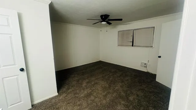 a en suite bathroom with a sink and a mirror