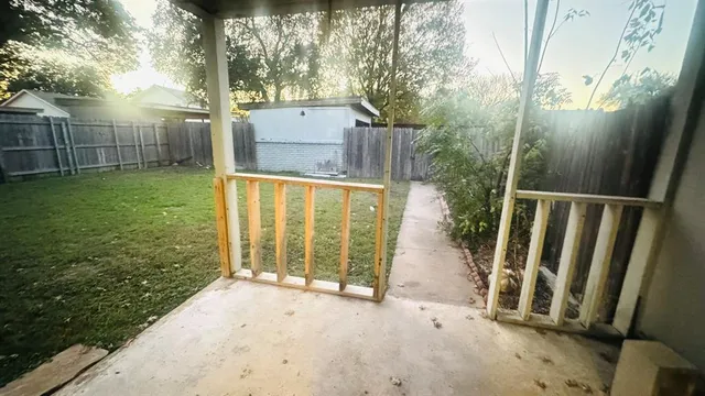 a view of a kitchen from the hallway