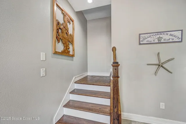 a bathroom with a shower sink and mirror