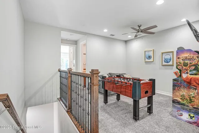 a spacious bedroom with two beds and a window