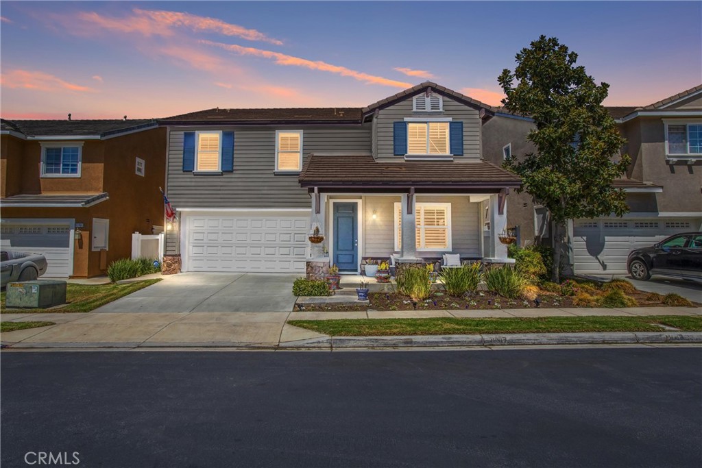 33978 Lily Road Yucaipa, CA 92399 - Photo 1 of 1 a front view of a house with a yard