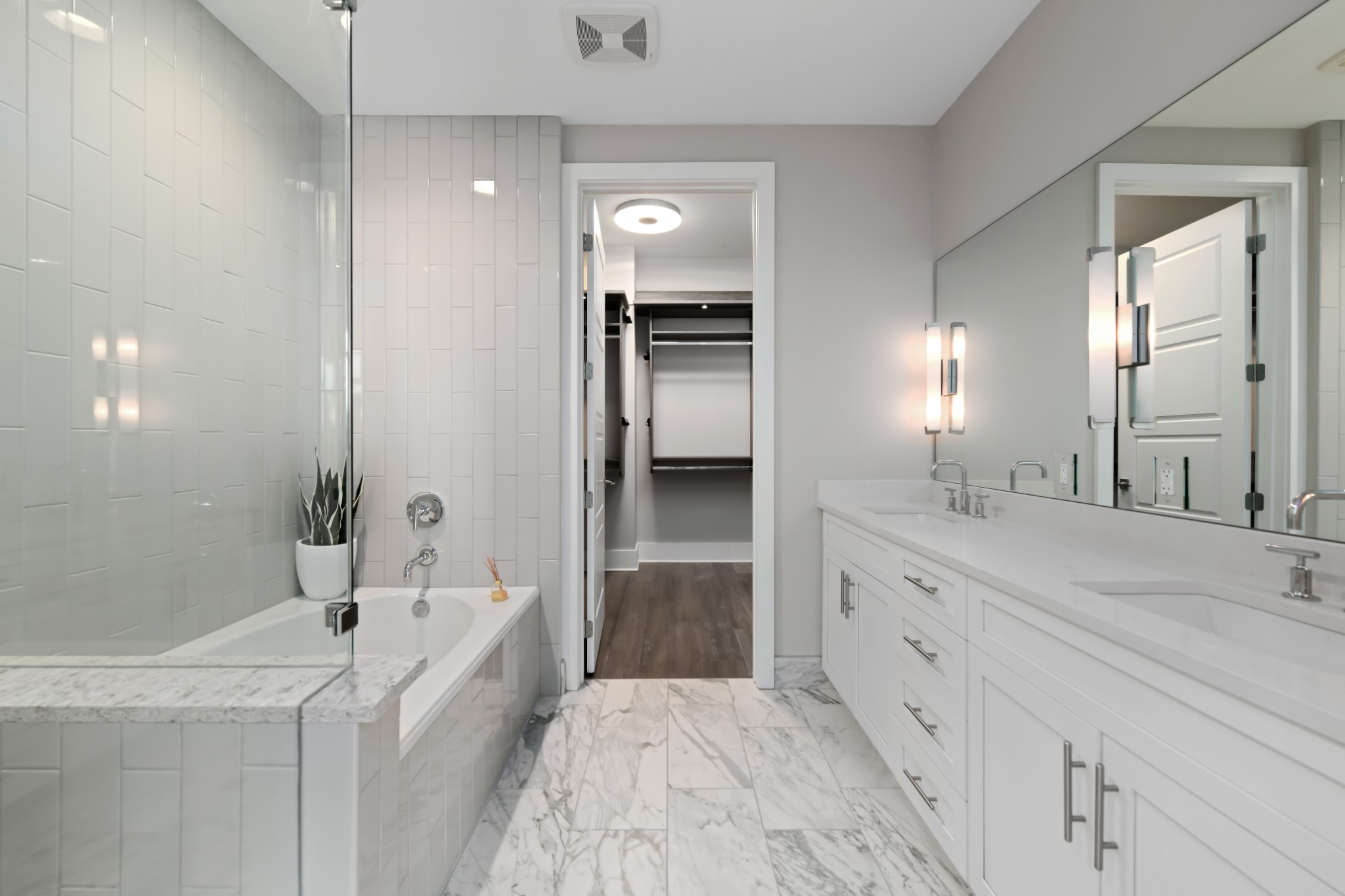20 Rutledge Street, Unit 707 Nashville, TN 37210 - Photo 13 of 51 a bathroom with a tub sink and mirror