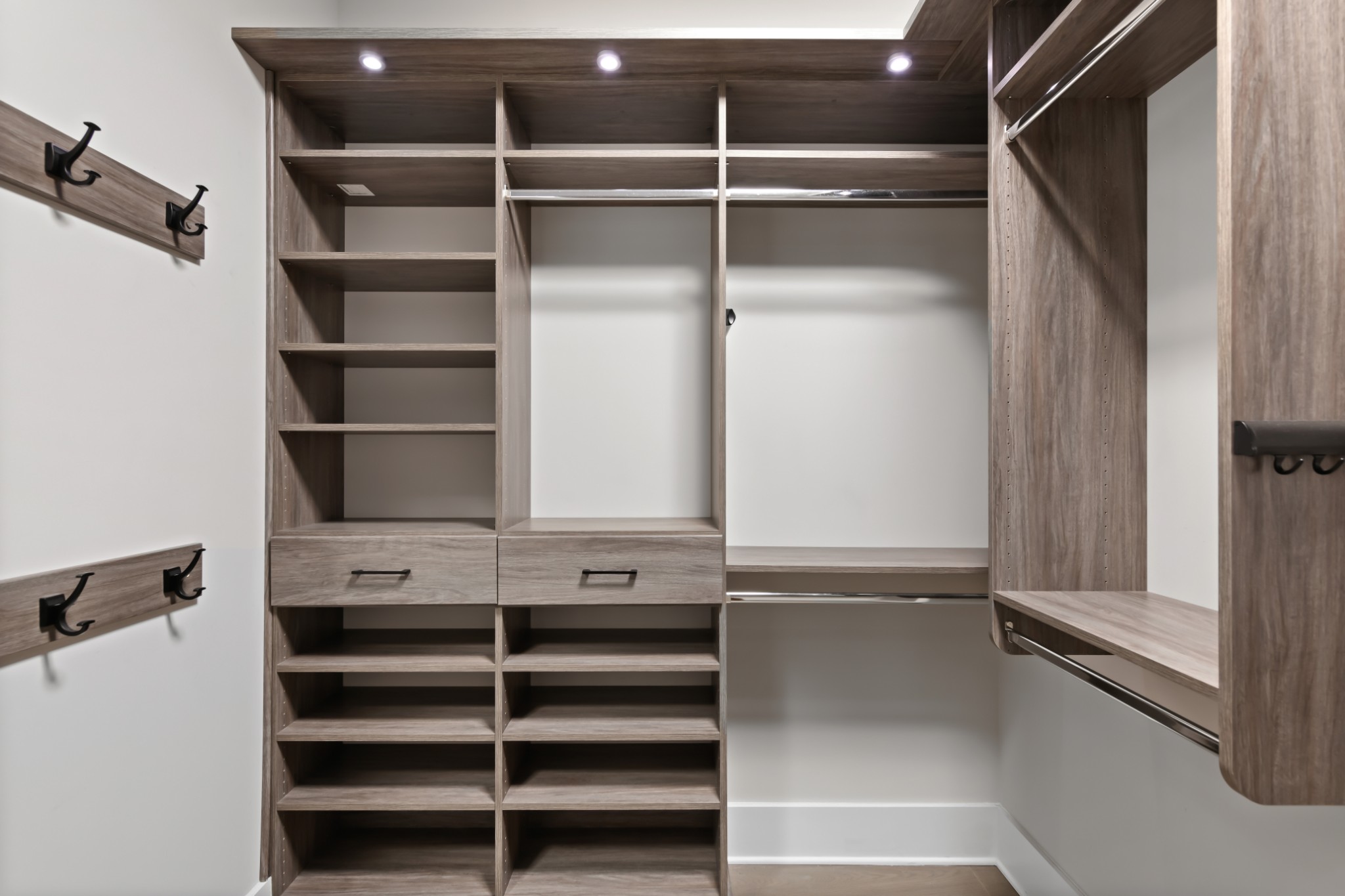 20 Rutledge Street, Unit 707 Nashville, TN 37210 - Photo 17 of 51 a view of walk in closet with empty racks
