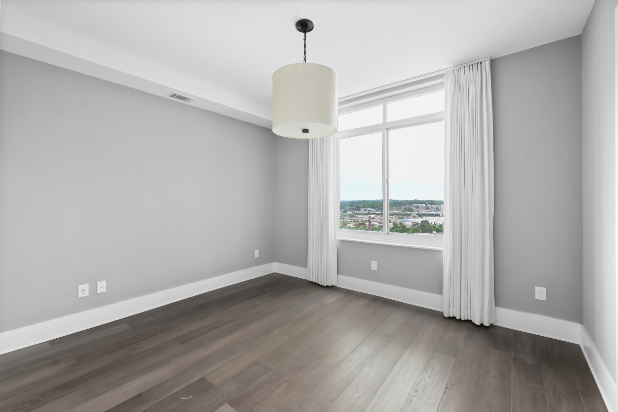 20 Rutledge Street, Unit 707 Nashville, TN 37210 - Photo 24 of 51 a view of an empty room with a window