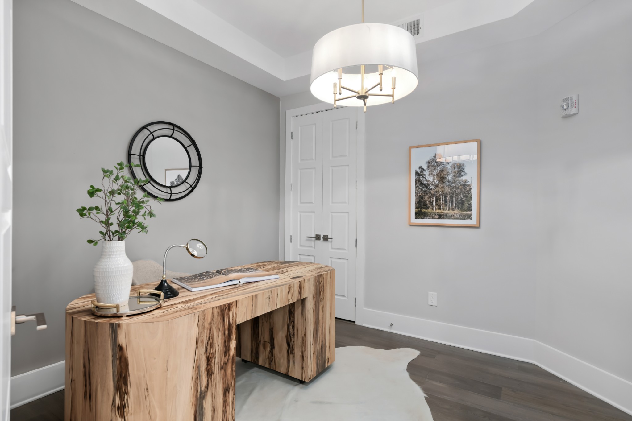 20 Rutledge Street, Unit 707 Nashville, TN 37210 - Photo 28 of 51 a view of a room with wooden floor and white walls