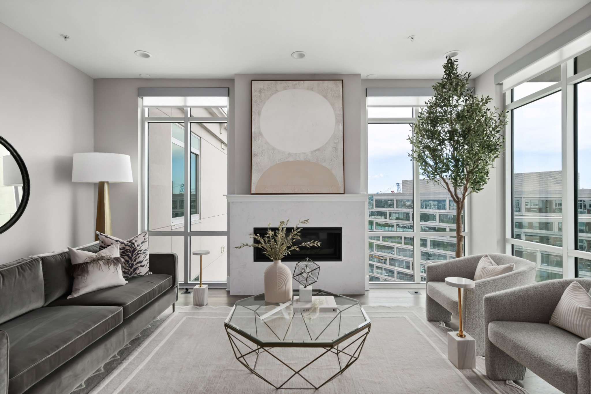 20 Rutledge Street, Unit 707 Nashville, TN 37210 - Photo 3 of 51 a living room with furniture and a fireplace