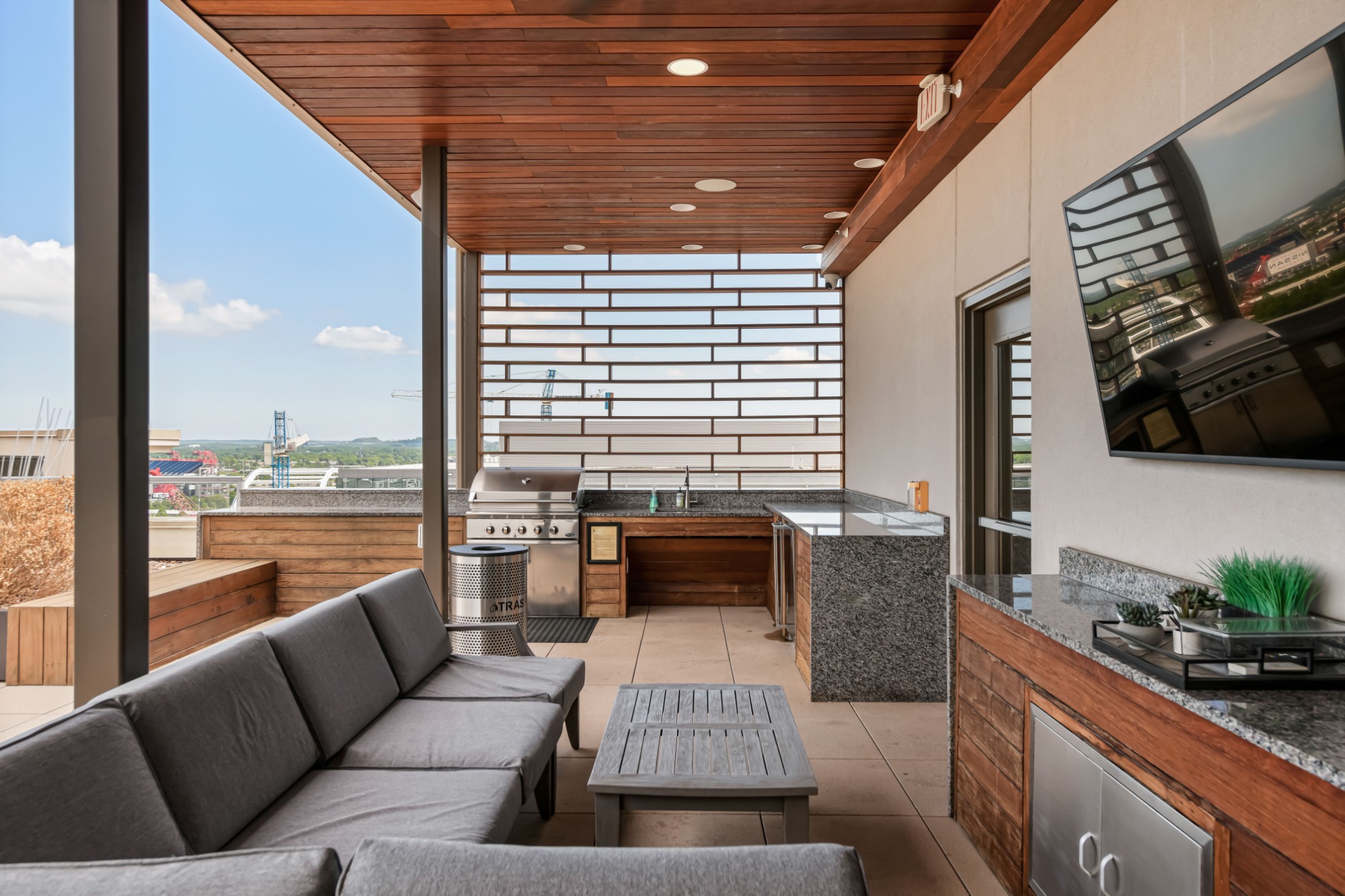 20 Rutledge Street, Unit 707 Nashville, TN 37210 - Photo 34 of 51 a living room with furniture and a flat screen tv