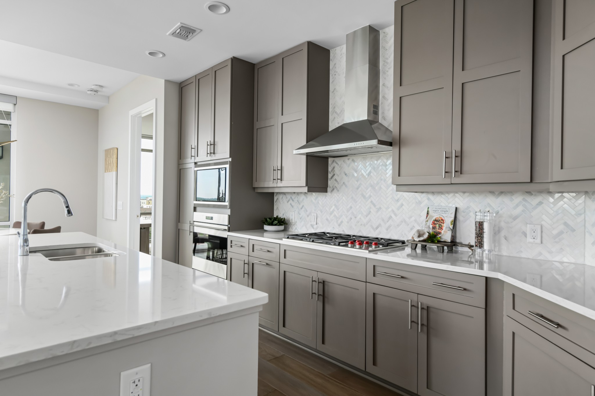 20 Rutledge Street, Unit 707 Nashville, TN 37210 - Photo 8 of 51 a kitchen with stainless steel appliances granite countertop a sink a stove and refrigerator