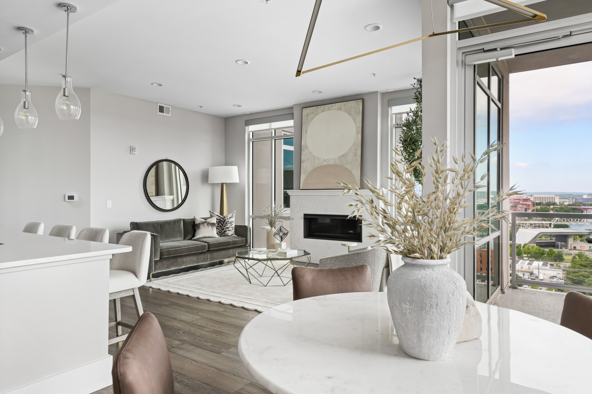 20 Rutledge Street, Unit 707 Nashville, TN 37210 - Photo 10 of 51 a living room with fireplace furniture and a large window