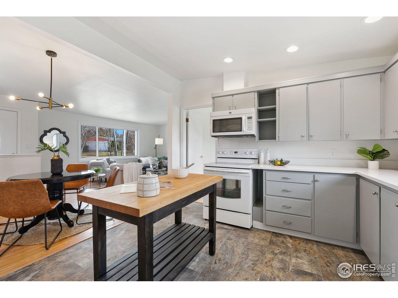 533 Crestmore Place Fort Collins, CO 80521 - Photo 9 of 19 a open kitchen with sink and cabinets